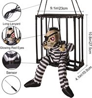Accessoire de décoration d'Halloween avec capteur de mouvement Crânes effrayants Cage Prisonnier Maison hantée Décor Décorations d'Halloween