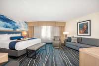Best Western Plus Ensemble de chambre à coucher moderne pour hôtel Meubles de chambre en métal Queen and King Meubles à panneaux en bois pour l'hospitalité commerciale