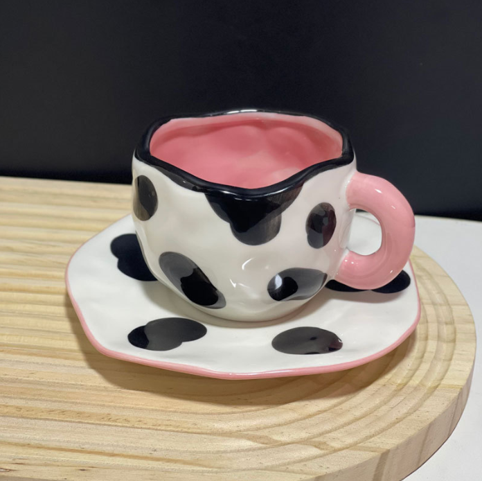 Cow with pink handle