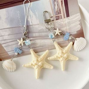 Wholesale Ocean Breeze Natural Shell Decorated Keychain Starfish Versatile Mobile Phone Pendant Vacation Accessory <b>Bag</b> <b>Charm</b> - Product Image 1