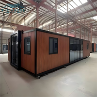 Maison conteneur préfabriquée de luxe moderne en acier 20FT/30FT/40FT, extensible, avec salle de bain et cuisine, anti-corrosion, ignifuge, pour extérieur