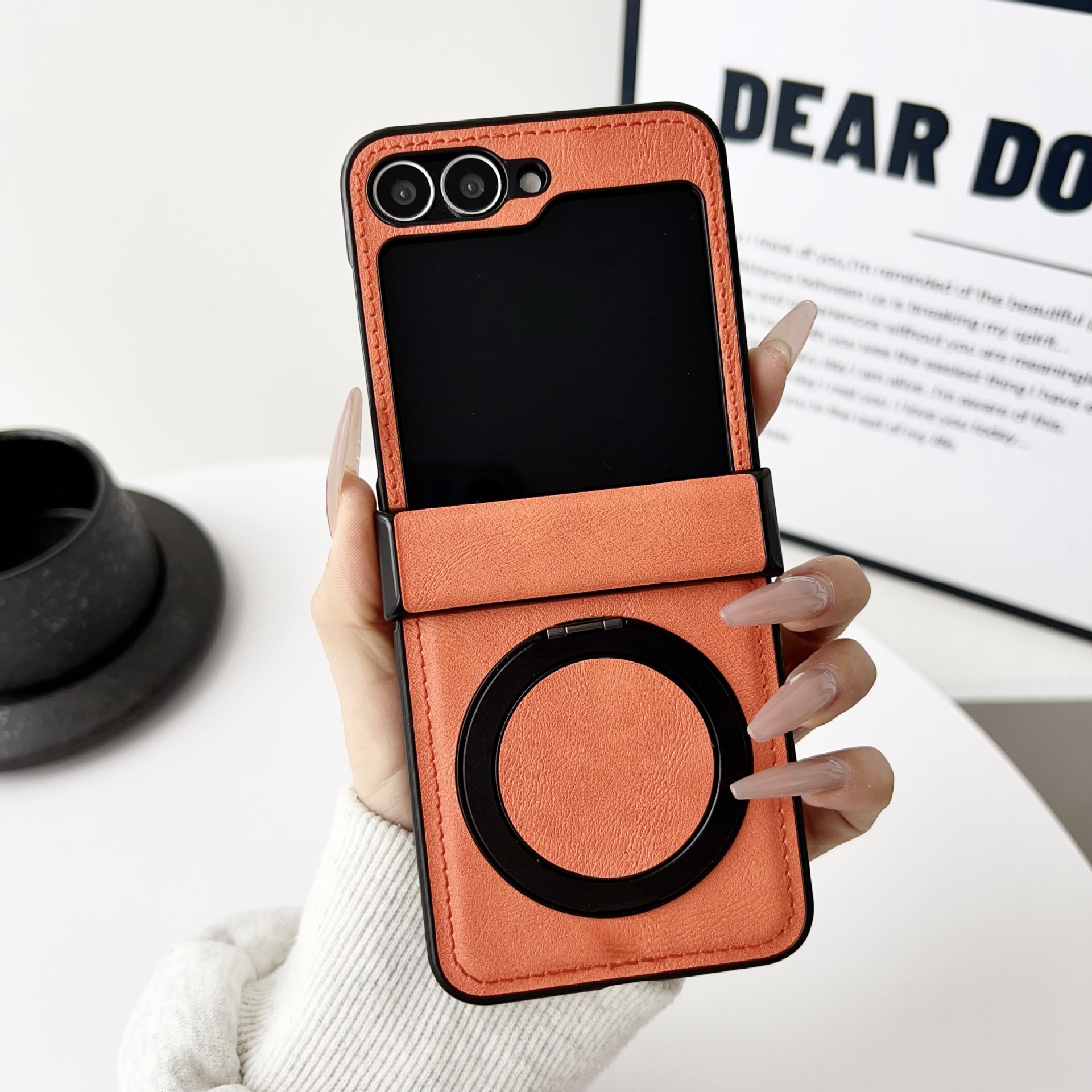 Supporto arancione + rotante