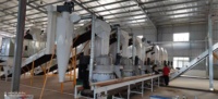 Venta caliente China Shandong Operado automático PLC Control Completo Biomasa Madera Paja Maíz Cob Husk Pellet Línea de producción en Ghana