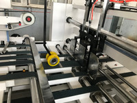 Machine automatique à plier et à coller le carton ondulé