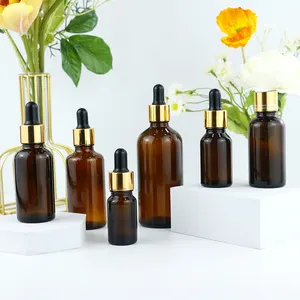 Amber 2 Oz Amber Clear Essential Oil Glass Gold Spiral Bottle Amber Empty Glass Bottles With Aluminium Gold Cap