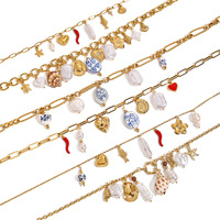 Collier Océanique Mirawell Tendance en Acier Inoxydable Plaqué Or PVD 18K avec Breloques en Céramique Corail, Étoile de Mer, Conque, Escargot, Poisson et Coquillage Perlé