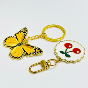 Tùy chỉnh logo kim loại cứng men Keychain côn trùng bướm 3D Keychain phim hoạt hình mạ vàng Keychain - Product Image 3