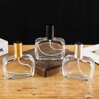 Vente en gros 50ml 1.67oz Bouteille de parfum vide transparente Bouteille d'atomiseur de parfum en verre plat avec bouchon noir argenté doré
