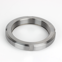 Écrou auto-serrant circulaire rainuré pour composants de transmission automobile et de transmission mécanique
