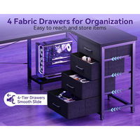 Bureau d'angle en L noir pour ordinateur, avec prises électriques intégrées et étagères réversibles, idéal pour la maison, le bureau, la chambre ou le salon, parfait pour le gaming.