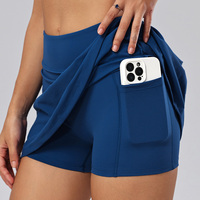Setelan Olahraga OEM Front Twist Nude Feel Sportswear dengan Rok Tenis Lipit Belakang Berpinggang Tinggi dan Celana Pendek Terpadu untuk Padel Pickleball