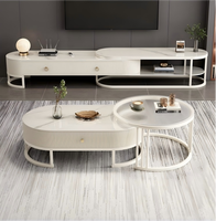 Table basse de salon moderne de luxe léger avec plateau en dalle de pierre et structure en métal doré, design nordique emboîtable, multifonctionnelle