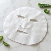 Masque facial non tissé en fibre de Lyocell, haute absorption d'eau, 32 g/m², tissu exfoliant pour soins de la peau