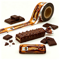 Rouleau de film laminé haute barrière résistant à l'humidité de qualité alimentaire personnalisé pour l'emballage de barres protéinées, de bonbons et de chocolat