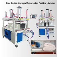 Machine de compression et d'emballage sous vide automatique à double station pour couettes, coussins et textiles souples
