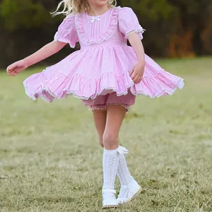 ชุดเดรสผ้าลูกไม้สำหรับเด็กผู้หญิงทำจากผ้าลายสก็อตสีชมพูขนาดเล็กสไตล์วินเทจสำหรับใส่ในบ้าน