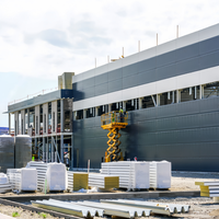 Entrepôt en structure métallique préfabriquée sur mesure à faible coût, conception moderne, bâtiment de stockage robuste en acier, usine