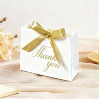 Sacs cadeaux en papier personnalisés avec nœud en ruban, sacs d'emballage haut de gamme pour remerciements, vente en gros pour fêtes de mariage, fournisseurs OEM