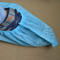 Protège-chaussures jetables non tissés antidérapants anti-poussière à motif roue pour laboratoire, visites à domicile, vente en gros, OEM