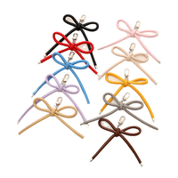 Porte-clés en cuir mignon avec nœud pour sacs, breloque de sac, accessoire de sac, breloque de sac à main en forme de nœud pour sacs à main, clés, cadeau d'anniversaire pour femmes