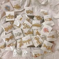 100 pinces à cheveux élégantes en métal avec strass de luxe pour filles, design aléatoire, accessoires de mode en gros de Yiwu