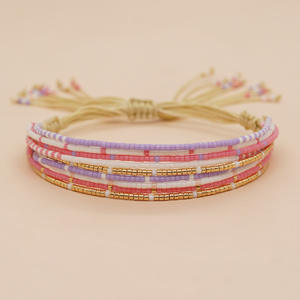 ट्रेंडी बोहो बहुस्तरीय हस्तनिर्मित मनके कंगन रंगीन बीज मोती समायोज्य कंगन महिलाओं के आभूषण - Product Image 1