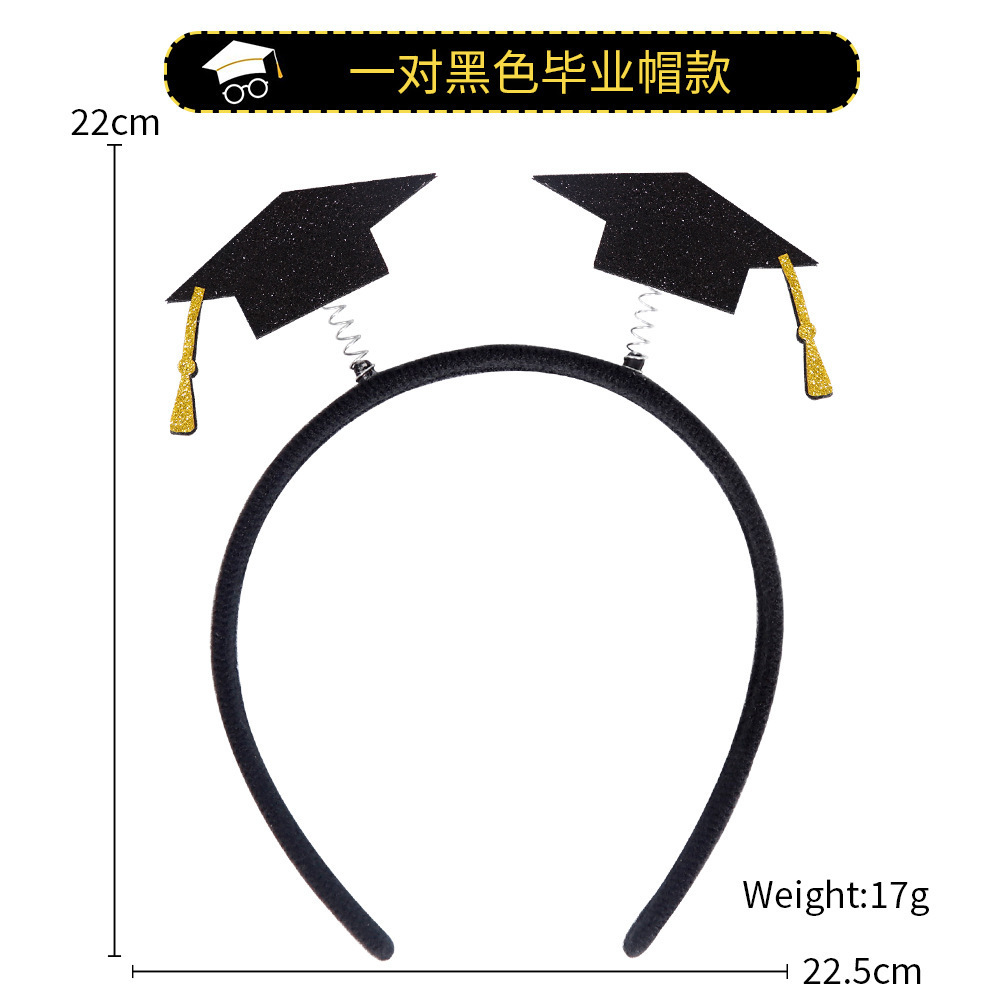 A pair of black graduation caps