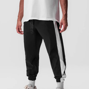 <span class=keywords><strong>Pantaloni</strong></span> da uomo Oversize all'ingrosso <span class=keywords><strong>bianchi</strong></span> <span class=keywords><strong>con</strong></span> <span class=keywords><strong>pantaloni</strong></span> in bianco <span class=keywords><strong>con</strong></span> maglia laterale in bianco per la moda e lo sport - Product Image 1