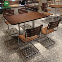 Tables et chaises de salle à manger en bois et fer forgé de style industriel américain pour hôtel, restaurant, café - usage commercial