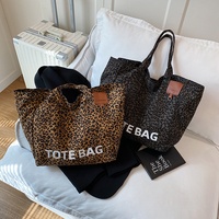 Sac fourre-tout en toile à imprimé léopard, unisexe, grande capacité, sac à bandoulière, sac à main décontracté pour les trajets quotidiens