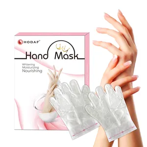 Máscara hidratando da mão com a máscara branca lisa do extrato vegetal