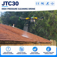 Drone de nettoyage haute pression UAV à jet d'eau de précision pour vitres de grande hauteur, conception compacte proche du mur pour l'entretien des centres commerciaux