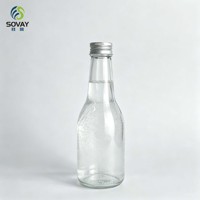 Bouteille en verre transparente vide de 235 ml pour boissons, idéale pour l'embouteillage commercial, la présentation de la marque et le stockage quotidien de liquides