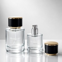 Flacon pulvérisateur de parfum en verre transparent personnalisé de 30 ml et 50 ml avec bouchon noir et or, atomiseur de parfum de luxe, emballage cosmétique en gros