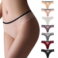 Set Celana Dalam Wanita Model Thong Berenda Tanpa Jahitan Ultra Tipis Pinggang Rendah Seksi Warna Solid dengan Desain Silang di Belakang