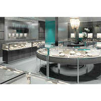 Vitrine ronde pour collier de bijouterie de centre commercial, mobilier de magasin de bijouterie personnalisé, comptoir de présentation en verre pour bijoux