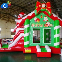 Château gonflable à thème de Noël, combo château gonflable avec toboggan pour la décoration d'événements de vacances en plein air