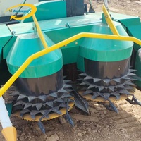 Moissonneuse-batteuse à maïs avec système de cueillette et d'écorçage pour l'ensilage de maïs et la récolte combinée de maïs