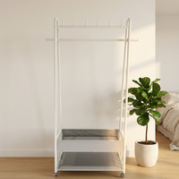 Porte-manteau pliable moderne à double niveau en fer pour magasin, salon, rangement de pantalons et chaussures, gain de place, écologique, durable