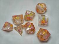 Ensemble de dés polyédriques en résine rose avec incrustations de fruit du dragon et de tranches d'orange, dés RPG à bords vifs pour jeux de table