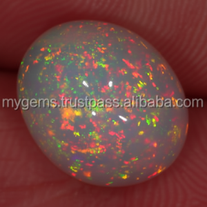 พลอยอัญมณีทรงวงรีทรงโค้งรูปวงรีโอปอลหลวมโอปอลไฟ weo จากธรรมชาติ - Product Image 1