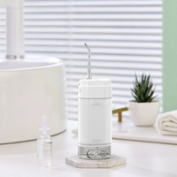Mini Hydropulseur Portable Étanche IPX7 avec Réservoir Amovible de 180 ml, Batterie de 1600 mAh, Type-C