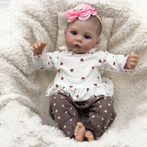 Muñeca Reborn Realista de Silicona de 46 cm para Niños de 4 a 6 Años, con Diadema de Flores Rosadas, Marca Privada con Licencia - Product Image 1