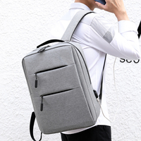 2023 grosir tas punggung Laptop bisnis tahan air anti-maling OEM dengan Port pengisi daya USB tas Laptop untuk pria