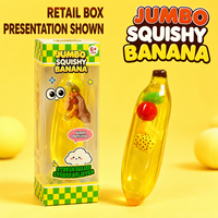Vente en gros de jouets à presser en forme de banane géante transparente, remplis de fruits, avec boîte de vente au détail et présentoir en carton
