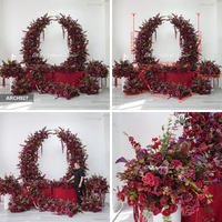 DKB En gros : Arches artificielles en forme de corne, plantes vertes et fleurs rouges en forme de corne pour la décoration artistique de l'arrière-plan de la scène de mariage