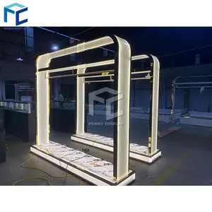Luxury Women Garment Shop Gold Clothes Display Racks For Clothing Store With LED Light
