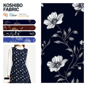 ผ้าเครปโคชิโบโพลีเอสเตอร์สีดำและสีขาวเนื้อหนา ดีไซน์สวยหรู เหมาะสำหรับตัดเย็บชุดเดรสยาวสำหรับผู้หญิงในช่วงเทศกาล - Product Image 1