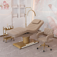 Table de massage électrique esthétique de luxe moderne noire et or pour salon de beauté, spa facial, extensions de cils et soins cosmétiques