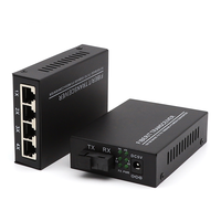 Convertisseur de média fibre optique monomode 10/100/1000 Mbps 4RJ45 + 10/100/1000 Mbps 1SC 20 km CE/FCC pour CCTV et applications industrielles